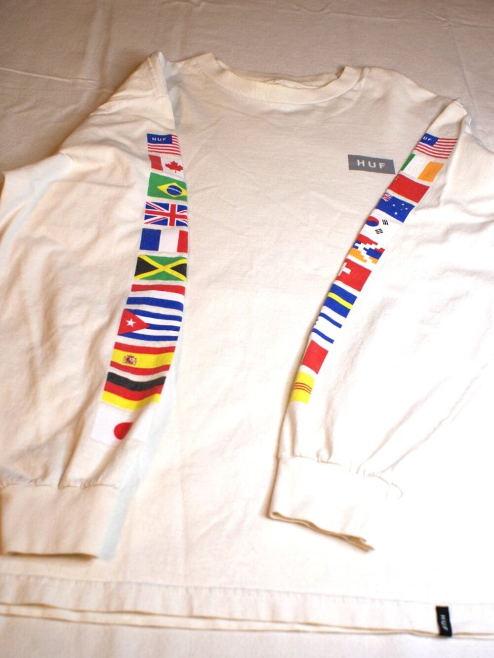 Huf T-Shirt with International flags on sleeve